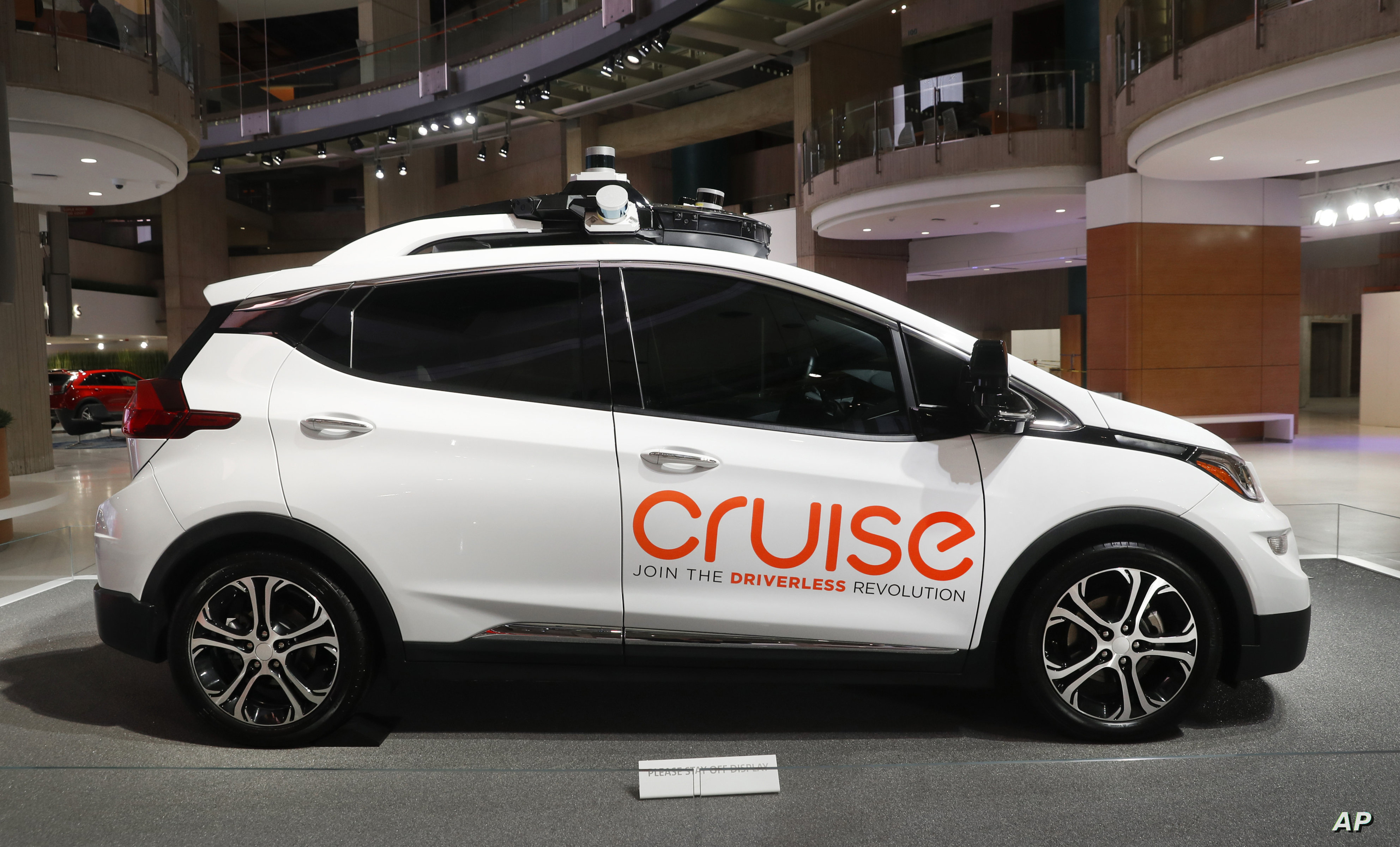FILE - In this Jan. 16, 2019, photo, Cruise AV, General Motor's autonomous electric Bolt EV is displayed in Detroit. General Motors’ self-driving car company has announced plans to expand a robotaxi service into new markets in Arizona and Texas before the end of this year. Cruise told investors at a banking conference Monday, Sept. 12, 2022, that an autonomous ride-hailing service that began charging San Francisco passengers in June will make its debut in Phoenix and Austin, Texas, within the next 90 days.  (AP Photo/Paul Sancya, File)