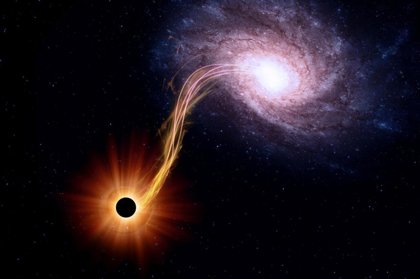 ثقب أسود يخالف توقعات العلماء ويفلت مادة من قبضته