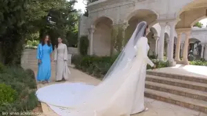 بصمات المصمم اللبناني العالمي ايلي صعب في العرس الملكي الاردني